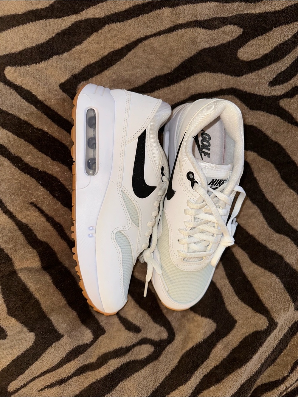 Nike Women’s White Sneakers with Black Swoosh and Gum Sole